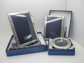 A Modern 925 Hallmarked Silver Rectangular Photograph Frame, on plush easel back, boxed; together