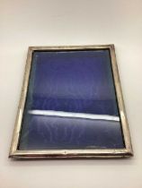 A Hallmarked Silver Rectangular Photograph Frame, overall height 25.5cm (lacking easel back). [