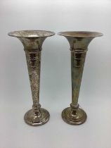 A Pair of Hallmarked Silver Vases, Walker & Hall, Sheffield 1917, each of tapering planished form,