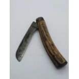John Petty and Sons, Sheffield, stag scales, flat bottom, worn blade, clicks on opening and