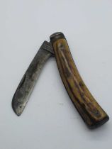 John Petty and Sons, Sheffield, stag scales, flat bottom, worn blade, clicks on opening and