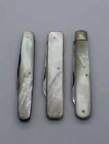 Harrison Fisher and Co, Sheffield, three blades, nail file, mother of pearl scales, work back, brass