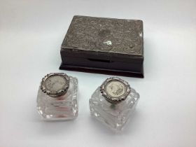 A Pair of Hallmarked Silver Mounted Glass Inkwells, together with a modern hallmarked silver mounted