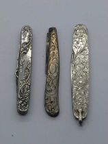 Silver ladies pocket knife, two blades, button hook, nail file, stamped silver scales (no name)