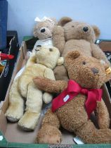 Four modern teddy bears to include Steiff Cosy Year Bear 2013, red bow, soft plush in brown, 38cm