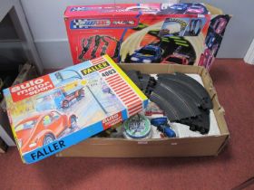 Slot car interest to include Faller #4003 Auto Motor Und Sport set comprising of two slot cars,