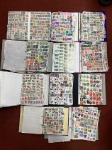 World stamps haphazardly mounted in eleven albums, includes some duplication.