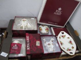 Royal Albert 'Old Country Roses' Clock, two dishes, a soap dish, a watering can, a teddy bear, and