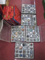 A collection of plastic display cases holding various rocks and minerals together with six