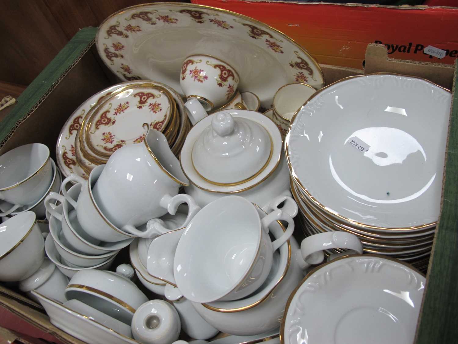 A 'Porcelana Schmid' tea service tcomprising of teapot, cups, saucers, bowls, jug etc. together with