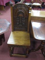 Joined Oak Hall Chair, with a carved panel back, solid seat, on turned and block supports (with