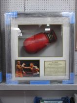 Joe Calzaghe Autograph, black pen signed (unverified) on a red right-hand boxing glove, as part of a