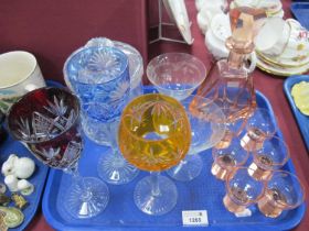 An Art Deco pink glass decanter of faceted form with six matching glasses, Elizabeth 'hand cut