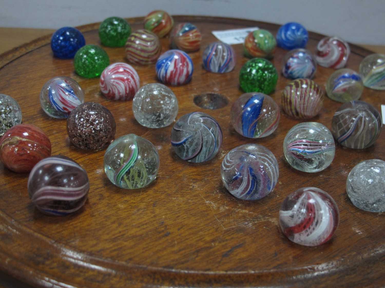 A solitaire board complete with Victorian marbles (32) dimensions board 27cm and all marbles about - Image 11 of 11