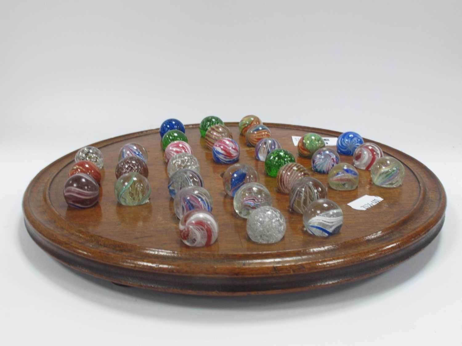 A solitaire board complete with Victorian marbles (32) dimensions board 27cm and all marbles about - Image 3 of 11