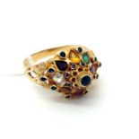 A Middle Eastern Style Dress Ring, multi collet high set between tapering shoulders, indistinctly
