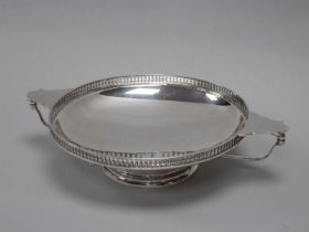 A Hallmarked Silver Twin Handled Footed Dish, Manoah Rhodes, London 1924, of circular form with