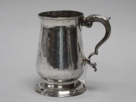 A Georgian Hallmarked Silver Mug, IK, London 1782, of plain baluster form, initialled "D" over "J.