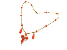 An Antique Coral and Pearl Drop Necklace, composed of chain and bead necklace, suspending double