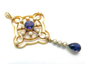 An Edwardian Amethyst and Pearl Set Drop Pendant, of openwork design suspending collet teardrop.