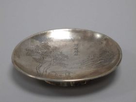 A Chinese Circular Dish, with engraved rural dwelling, on plain rim base, stamped character mark,