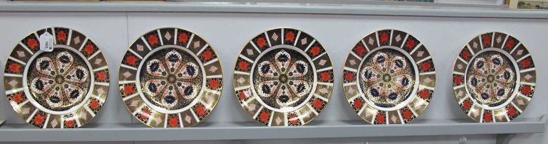 Five Royal Crown Derby Porcelain Dinner Plates, decorated in Imari pattern 1128, date codes for