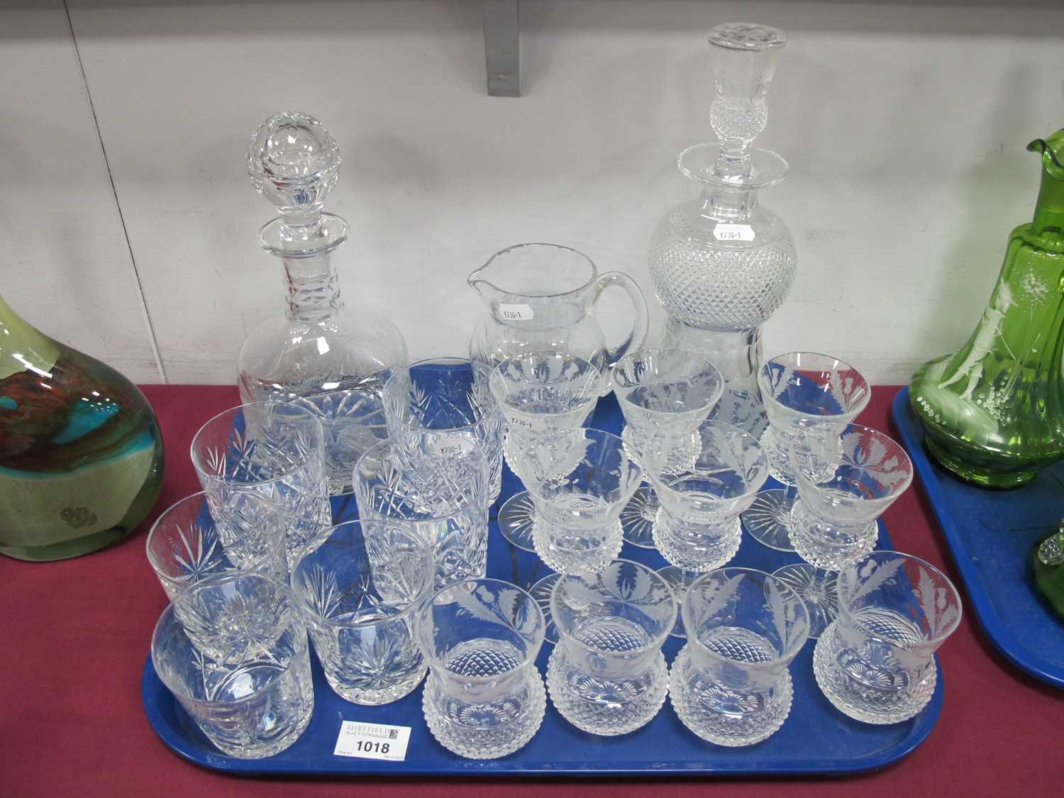 An Edinburgh Crystal Thistle Shaped Decanter and Stopper, with etched and cut decoration, stencil