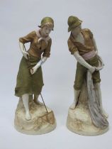 A Pair of Royal Dux Pottery Figures, modelled as a fisherman holding a net and his wife, each upon