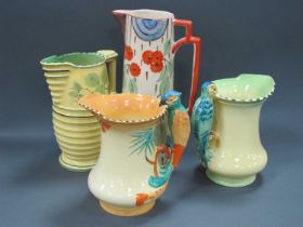 Two Burleighware Jugs, each with a parrot handle against a yellow ground, printed marks, 19cm