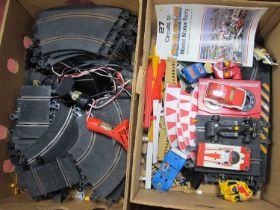 A quantity of Scalextric Slot Cars, Track, Spectators, Barriers, Lap Counter, Circuit Guide. Slot