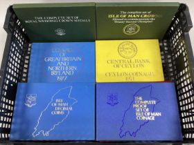 Collection Of Eight Coin Sets, includes 1977, 1985 and 1986 Royal Mint GB year sets, 1971 Ceylon,