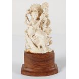 19TH-CENTURY CARVED IVORY FIGURE OF SARASWATI