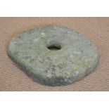 19TH-CENTURY IRISH VERNACULAR CORN GRINDING STONE