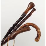 GROUP OF 4 EARLY 20TH-CENTURY WALKING STICKS