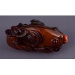 CHINESE AMBER SNUFF BOTTLE AND STOPPER
