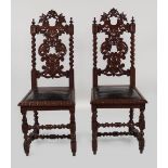 PAIR 19TH-CENTURY CARVED OAK HALL CHAIRS