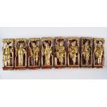 SET OF 8 CHINESE CARVED GILTWOOD LOHAN FIGURES