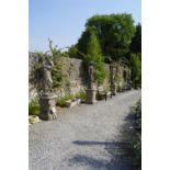 SET OF FOUR MOULDED STONE FIGURES