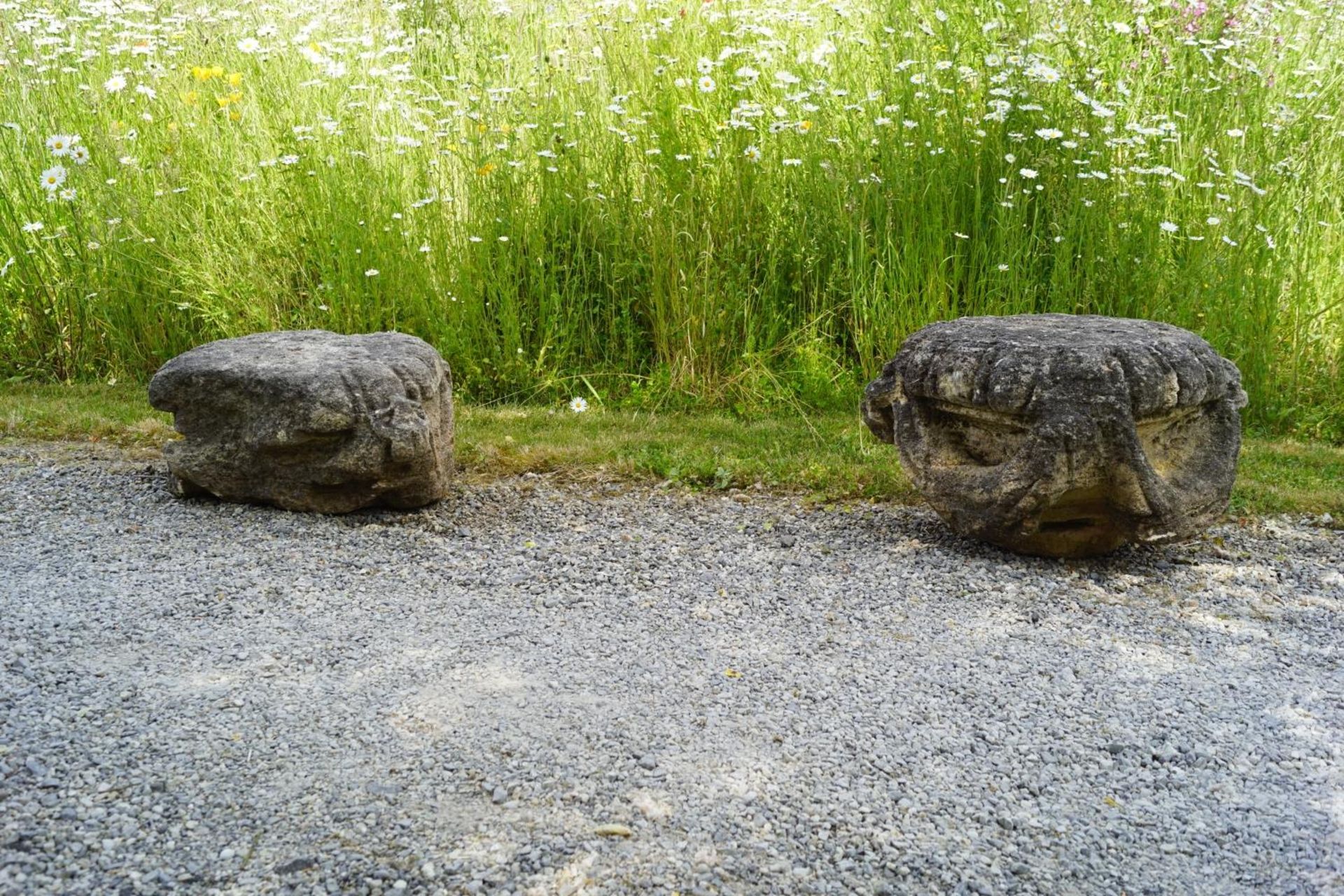 PAIR OF 17TH/18TH-CENTURY SCULPTED STONE CAPITALS