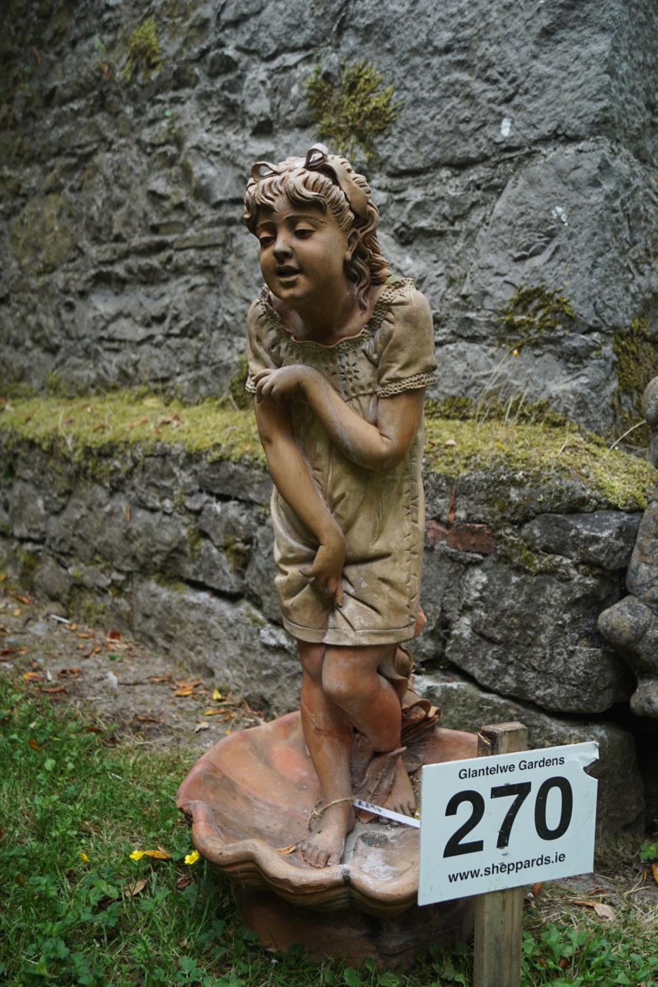 19TH-CENTURY TERRACOTTA FIGURE STEMMED BIRDBATH