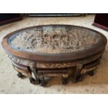 20TH-CENTURY CARVED ORIENTAL NEST OF 7 TABLES