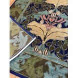AN EXCEPTIONAL C.F.A. VOYSEY DONEGAL RUG