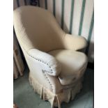 THREE UPHOLSTERED SWIVEL ARMCHAIRS