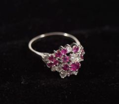 WHITE GOLD RUBY AND DIAMOND CLUSTER RING