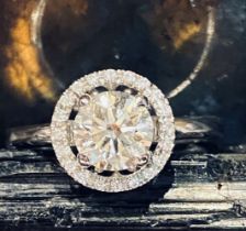 18 CT. DIAMOND HALO RING