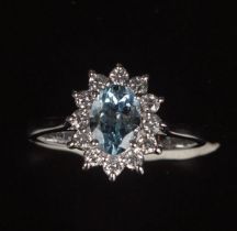 18 CT. GOLD AQUAMARINE & DIAMOND RING