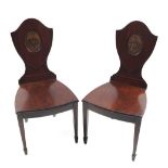 PAIR HEPPLEWHITE ARMORIAL HALL CHAIRS