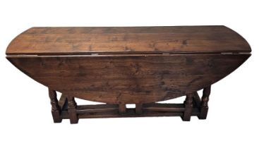 17TH-CENTURY STYLE OAK GATE LEG DINING TABLE