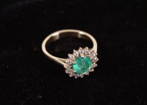 EMERALD AND MOISSANITE CLUSTER RING