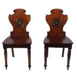 PAIR REGENCY ARMORIAL HALL CHAIRS